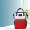 Mochila cambiador multifuncional detalle frontal en bloque de color rojo y blanco. - Rojo
