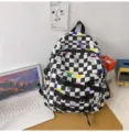 Grande zaino a quadri bianchi e neri con blocchi colorati e stampa di orsetto carino per la scuola. - 30*17*46 / Nero