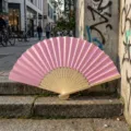 Elegant pink folding fan with natural bamboo ribs and blank fabric surface for DIY crafts - P款7号-镂空彩纸扇(粉色)