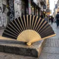 Elegant black folding fan with natural bamboo ribs for wedding gifts and DIY crafts - P款8号-镂空彩纸扇(黑色)