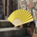 Solid bright yellow folding fan with natural bamboo ribs for weddings and DIY decor - Style R No.13 Plain Colored Paper Fan (Lemon Yellow)