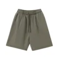 Detailed view of men vintage washed drawstring shorts, showcasing soft fabric and casual fit. - Army Green