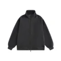 Detailed closeup view of black heavyweight stand collar full zip up jacket and ribbed hem style. - Dark Gray