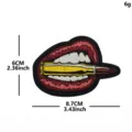Cool tactical embroidered patch featuring a bullet and lips design, ideal for jackets and bags. - Red Lips Bullet (Red)