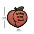 Cute peach embroidered patch with funny text design, perfect for clothing and bag decoration. - Peach Butt
