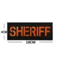 Parche táctico reflectante SHERIFF insignia moral bordada negra 10x4cm para chaleco táctico. - SHERIFF Reflectante / 10x4cm / Negro Naranja