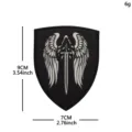 Detail view of the embroidered morale patch featuring a dark wing and sword design, 9x7cm. - Angel Sword Wings (Black and White)