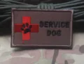 Embroidered service dog morale patch with red cross and paw print for tactical gear or pet vests. - V00580-5 Rescue Service Dog (Square Brown)