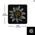 Tactical embroidered morale patch with reflective edelweiss design, 5x5cm size, lightweight. - Reflective Edelweiss (Black White)