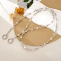 Silver beaded crossbody phone strap with star crystal accents and pearl beads. - Silver (K5977)