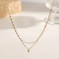 Minimalist double-layered gold titanium steel necklace featuring a single crystal pendant - Single Rhinestone Lip Chain Necklace / Gold