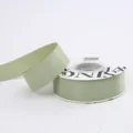 Light green double-faced satin ribbon roll for gift wrapping, flower bouquets, and crafts decor. - 2.5cm / Cream Green