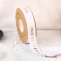 White woven ribbon with gold stamped text, perfect for DIY gift wrapping and floral decoration. - Width 2.5cm * Length 45 Yards / Pure White