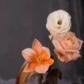 Handmade artificial flower arrangement featuring three elegant blossoms in soft pastel tones. - Orange / 250ML