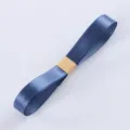 Solid blue satin ribbon for floral packaging, gift wrapping, and handmade DIY bows. - Haze Blue