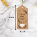 Etichetta regalo in carta kraft con cuore intagliato e testo di ringraziamento, 9.5x4.5cm. - LH-325 / Confezione da 100 / colore pelle di mucca