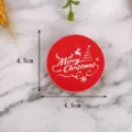 Vista dettagliata dell'etichetta rotonda di Natale, carta rossa con motivo festivo bianco. - Butterfly / Confezione da 100 / Rosso