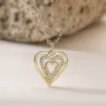 Collar con colgante de corazón hueco multicapa chapado en oro con circonita cubica vista principal. - Estilo Hueco Triple Anidado(25363)