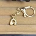 Gold plated metal bubble letter keychain and bag charm stylish pendant accessory - Letter A