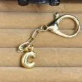 Gold plated bubble letter C keychain pendant, stylish metal bag charm and key ring accessory. - Letter C