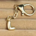 Gold plated puffy letter L keychain bag charm elegant metal alphabet pendant accessory - Letter L