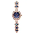Detailed view of women's quartz bracelet watch with blue dial and crystals - Rhinestone Sapphire-Color Floral Bracelet Style / Blue