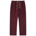 Burgundy fleece sweatpants with adjustable drawstring, ideal for casual wear and daily sports. - S / Bottoms / Burgundy