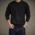 Close-up detail view of men's black heavy cotton raglan long sleeve t-shirt, daily wear. - S / Tops / Black