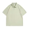 Light green short sleeve polo shirt detail, classic lapel casual summer top for men and women. - Light Green
