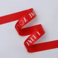 Red satin ribbon with English letters printed, perfect for floral bouquet packaging and DIY bows. - English Letter Style / 1 Roll/Volume / Red