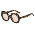 Chunky round tortoise shell sunglasses featuring thick geometric frames and gradient lenses. - Demi Frame Light Tea Lens