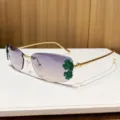 Trendy metal rimless sunglasses with gradient lenses and stylish green leaf decorations. - Gray Yellow
