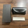 Portable black leather sunglasses case set with storage box and cleaning cloth for daily use. - Case Cloth Bag Set