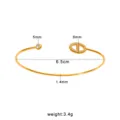 Vergoldeter Armreif aus Titanstahl mit Ankerketten Motiv und funkelnden Zirkonia Steinen. - 8mm Schweinenase Offener Stil