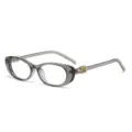 Graue transparente Retro-Katzenaugen-Brille mit schicken goldenen Bügelakzenten, stilvoll. - Transparent Grau Rahmen Blaulichtfilter