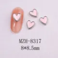 Detailed view of 8x8.5mm pink heart nail art charms with silver metal border decorations - 8317 Silver Border White Pearl (8x8.5mm)