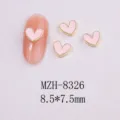 Close-up of pink heart nail art charms with gold metal edges showing dimensions. - 8326 Gold Border Pink Oil Dripping (8.5x7.5mm)