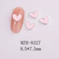 Close-up of pink enamel heart nail art charms with silver beaded metal edges. - 8327 Silver Border Pink Oil Dripping (8.5x7.5mm)