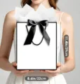 Elegant white paper gift shopping bag with large black satin ribbon bow decoration - 22.9*17.8*8 / Black Frame White Paper