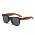 Gafas de sol elegantes con monturas negras y patillas de madera para una gran protección UV - Lente Gris