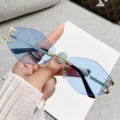Rimless polygonal fashion sunglasses with light blue gradient cut lenses and metal claw details. - Rimless Polygon / Gold Frame Double Blue Lens