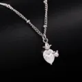 Close-up detail of silver clavicle chain with a teardrop crystal and cute rabbit pendant. - Water Drop Bunny Style (DZ10193)