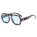 Grosse quadratische Schildpatt-Sonnenbrille mit hellblauen Glaesern fuer den Alltag. - Blumenrahmen Blaue Gläser
