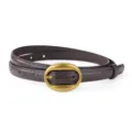 Vintage brown thin leather belt detail shot, featuring classic oval brass buckle close-up. - Coffee