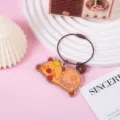 Cute capybara acrylic keychain with steel wire ring and cute floating charm pendant. - Sleeping Guinea Pig (B299)