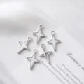 Detailed macro view of silver star charms with white shell inlay for DIY jewelry design - Hollow Star / 21.5mm*14.5mm / Silver (White Enamel)