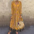 Full length view of a bohemian yellow vintage floral V-neck faux two-piece maxi dress - S / Dresses / Yellow