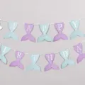 Mermaid birthday banner decoration set with cute paper tail cutouts for kids celebration. - Mermaid Birthday Banner (Silver Foil Style)