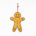 Christmas gingerbread man hanging ornament, cute holiday decor for door or tree. - Gingerbread Man Hanging Decoration