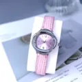 Pink leather strap women quartz watch with crystal bezel, delicate detail shot for daily wear. - Pink